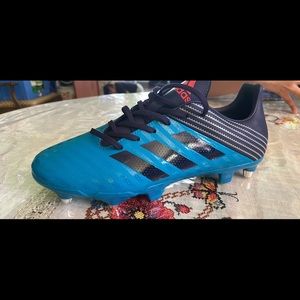 Rugby cleats, don’t fit me and lost the receipt. Soft ground cleats